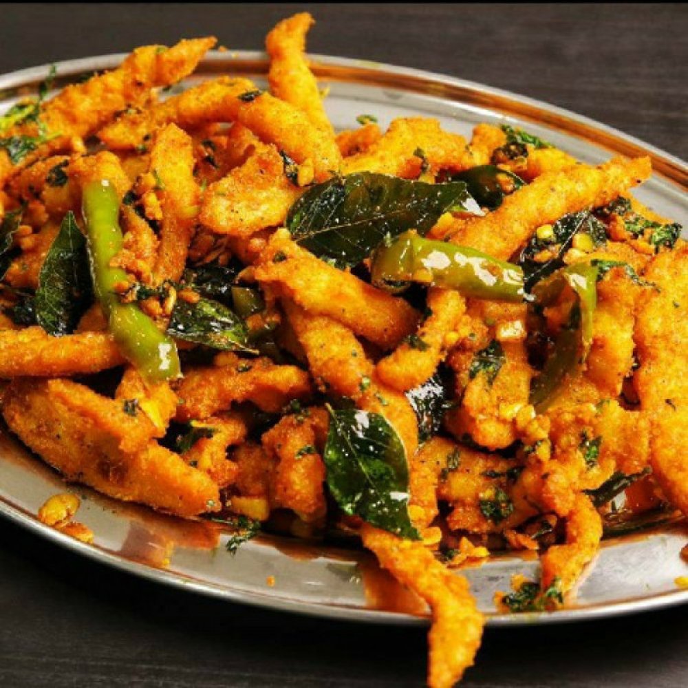 Chicken Majestic, buttermilk-marinated fried chicken strips with curry leaves